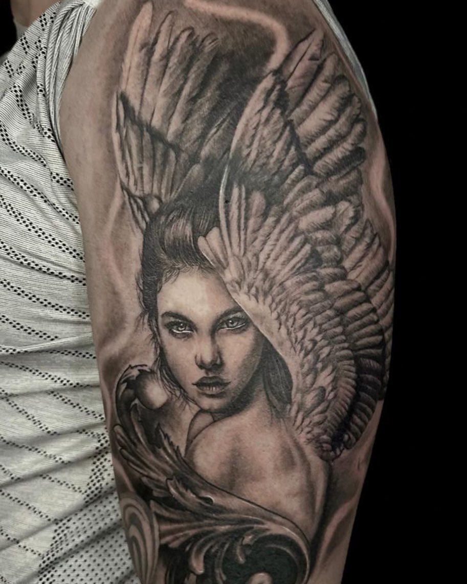 Transforming Arms into Art: Top 68 Tattoo Sleeve Ideas 41 Angel Sleeve Black and White Tattoo