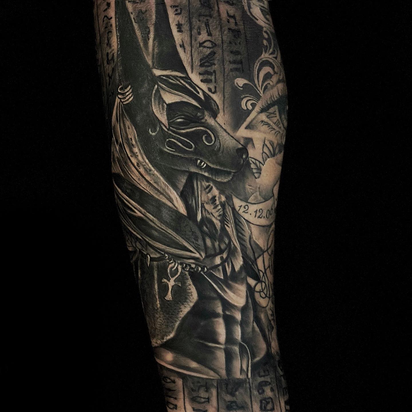 Transforming Arms into Art: Top 68 Tattoo Sleeve Ideas 47 Anubis Leg Black and White Tattoo