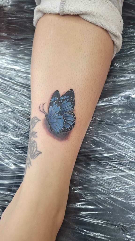 Butterflies on forearm Color Tattoo