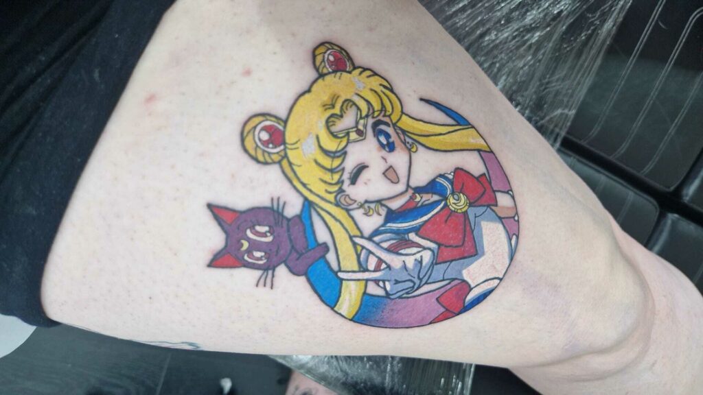 Cartoon Character Thigh Color Rework Tattoo