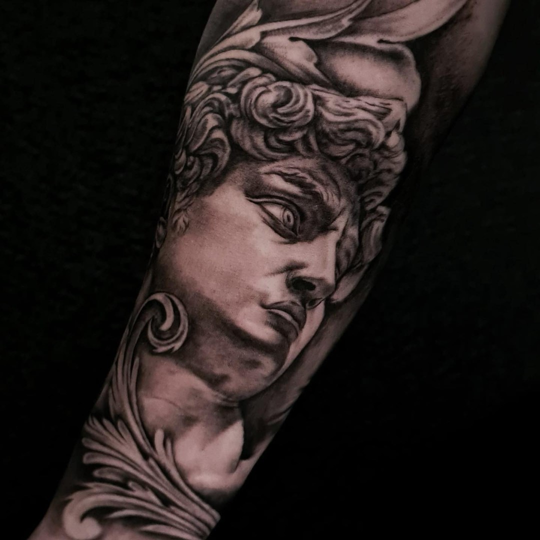 Transforming Arms into Art: Top 68 Tattoo Sleeve Ideas 61 David by Michelangelo Forearm Black and White Tattoo