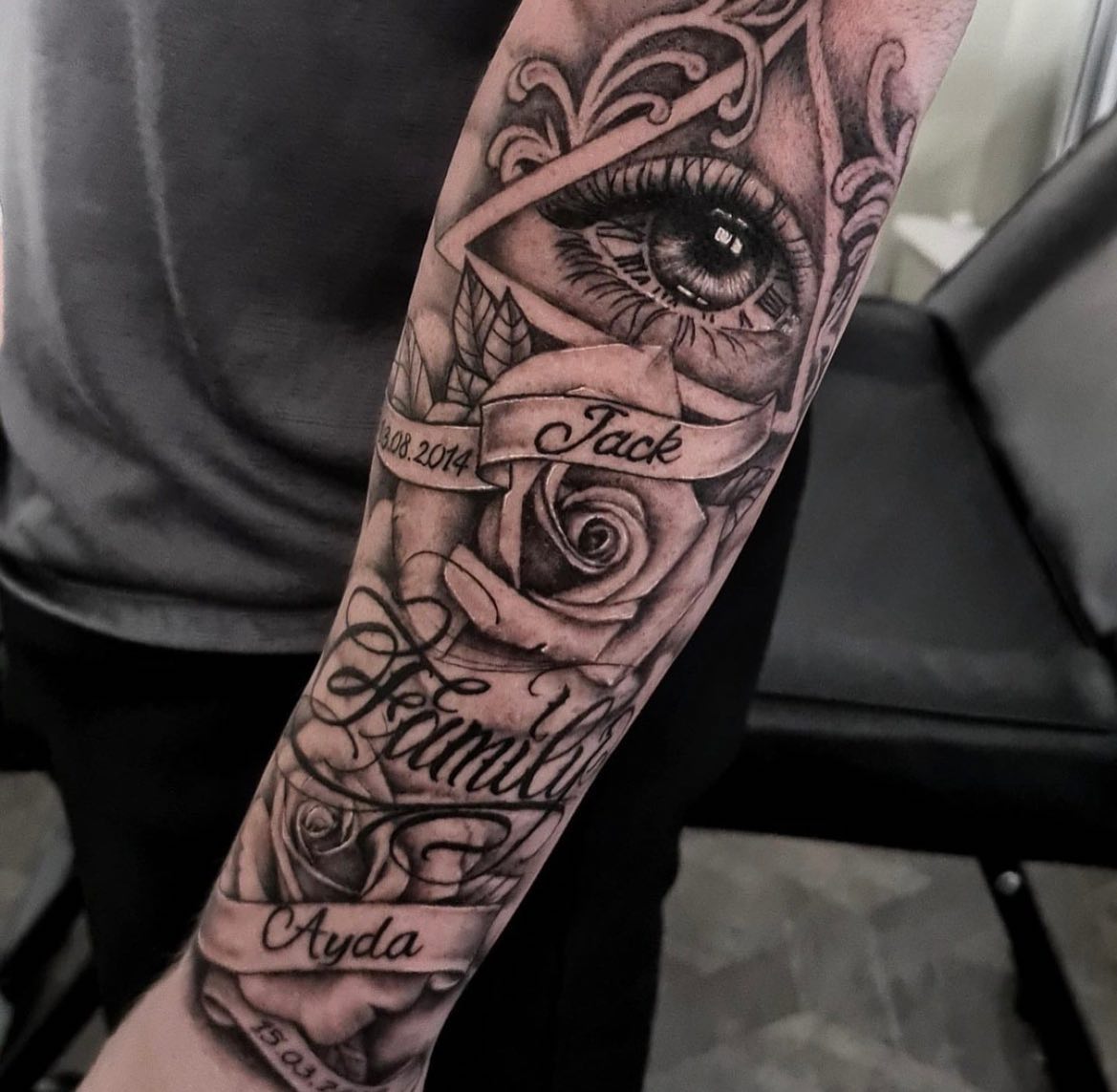 Transforming Arms into Art: Top 68 Tattoo Sleeve Ideas 66 Eye and Roses Forearm Black and White Tattoo