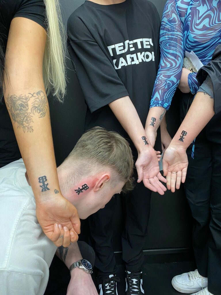 Symbol Wrist Black and White Tattoo