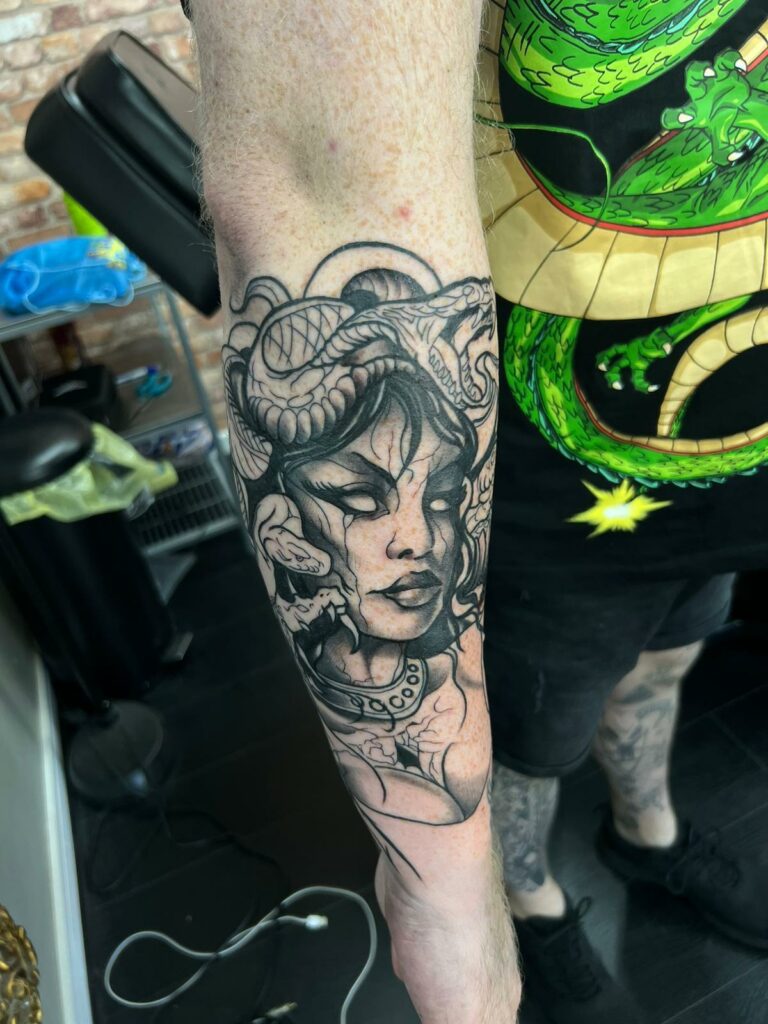 Women Back Forearm Black and White Tattoo