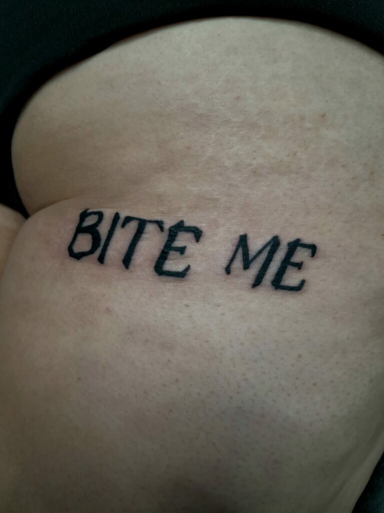 Bite Me Biceps Black And White Tattoo