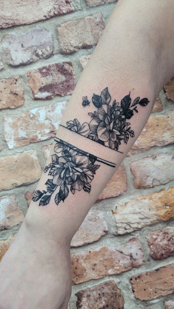 Black Flowers Wrist Tattoo