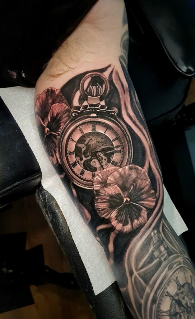 Clock And Flower Leg Color Tattoo