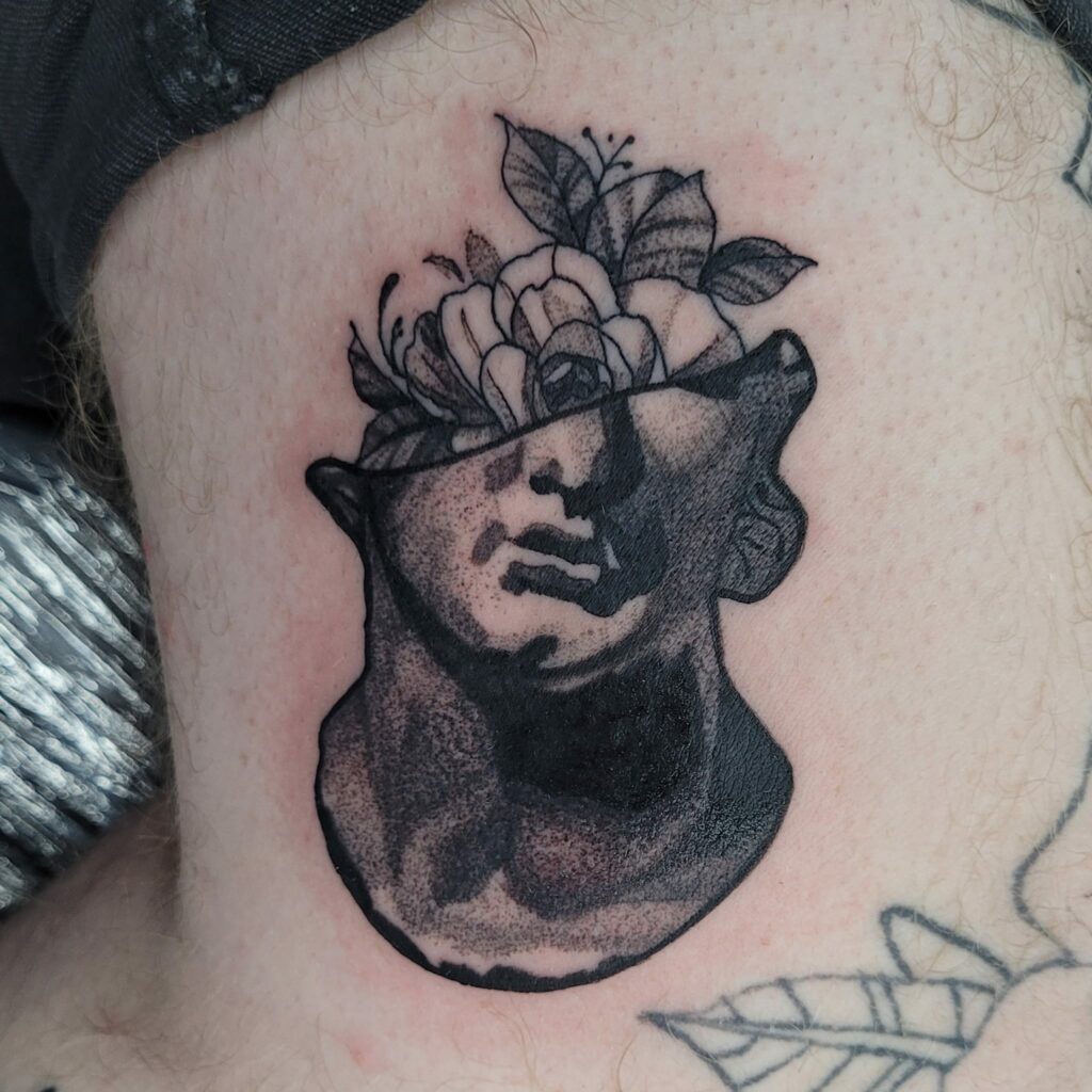 Guy with Flower Black and white Tattoo