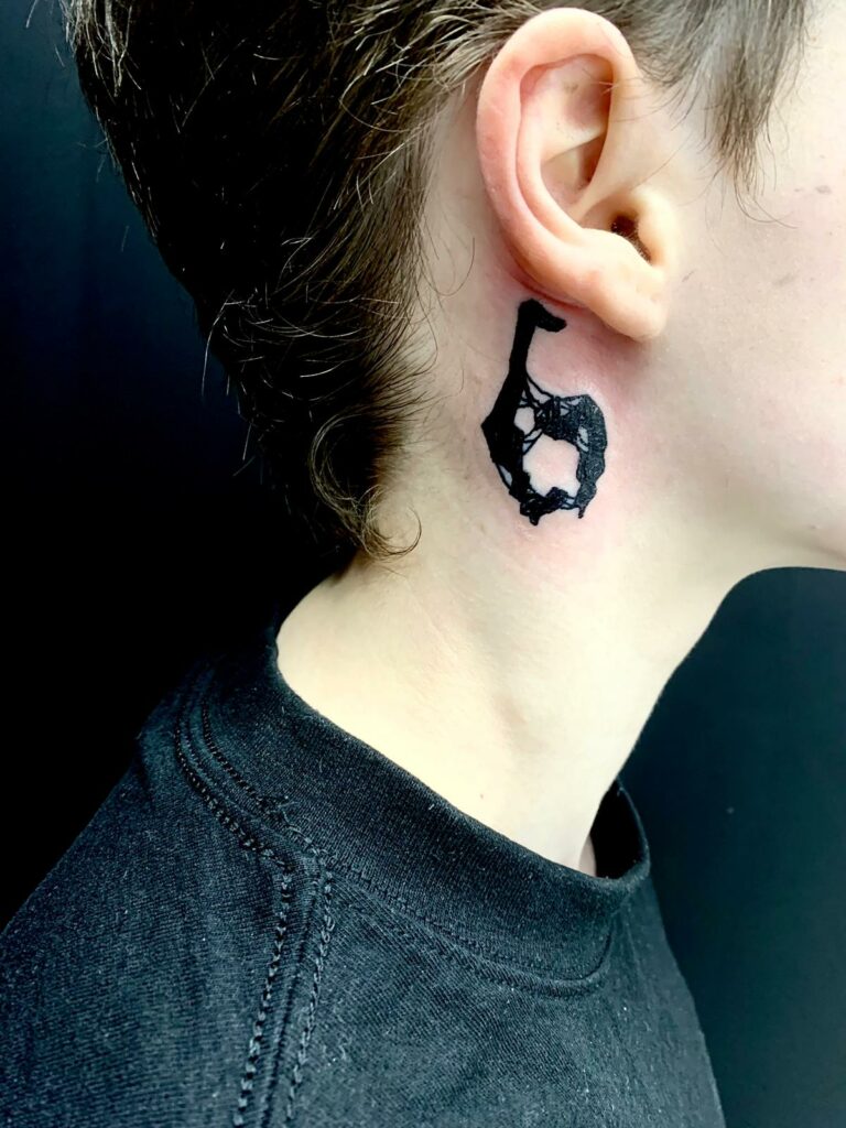 Logo Neck Black And White Tattoo