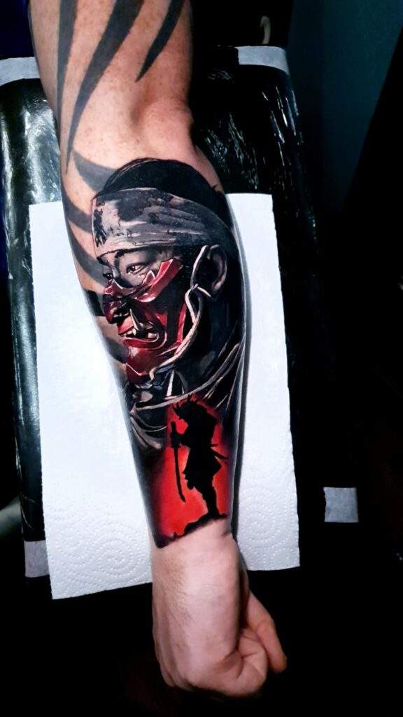 Warrior Face Back Of Hand Color Tattoo
